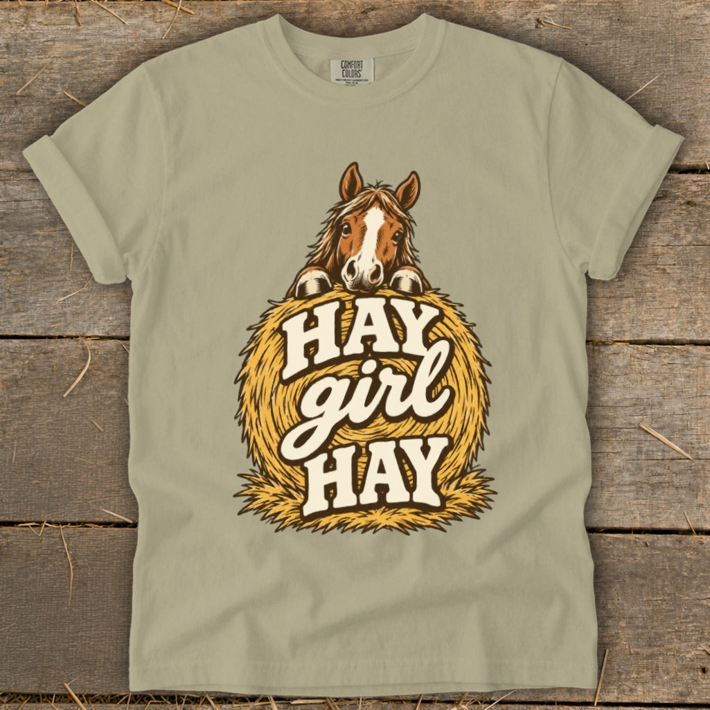 T-shirt with horse peeking over hay bale and text "Hay girl HAY".