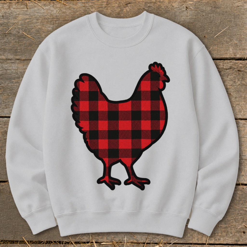 White sweatshirt featuring a red and black buffalo plaid chicken design.