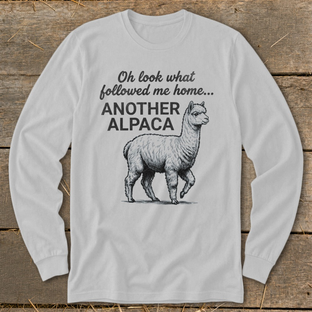 Long-sleeve shirt with an alpaca graphic and text: "Oh look what followed me home... ANOTHER ALPACA"