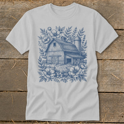 Barn with silo surrounded by flowers and foliage design.