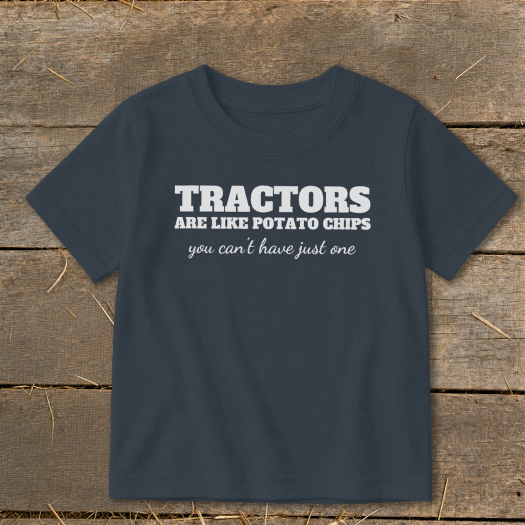 Navy t-shirt with white text: "Tractors are like potato chips, you can't have just one."