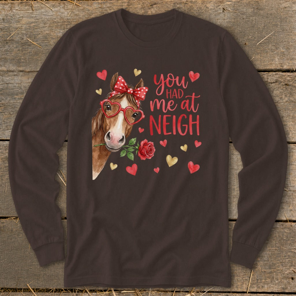 Brown long-sleeve shirt with a horse wearing heart glasses and text "you had me at neigh".