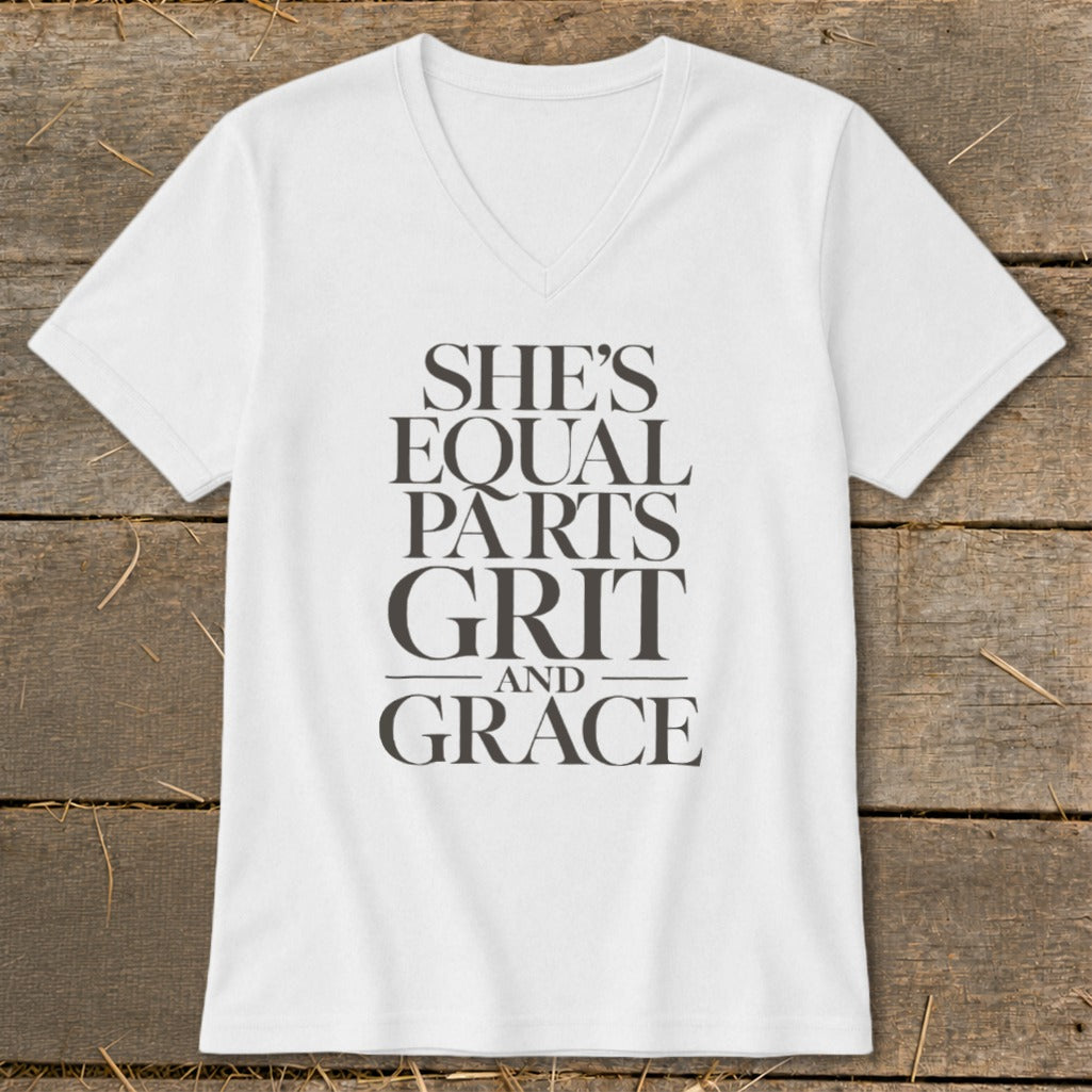 White v-neck t-shirt with "She's Equal Parts Grit and Grace" text.