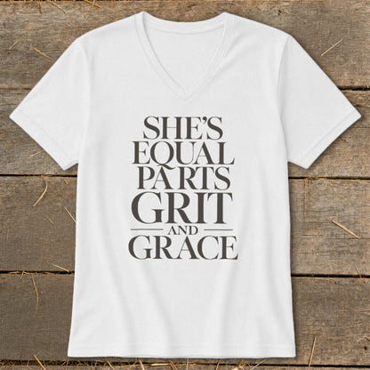 White v-neck t-shirt with "She's Equal Parts Grit and Grace" text.