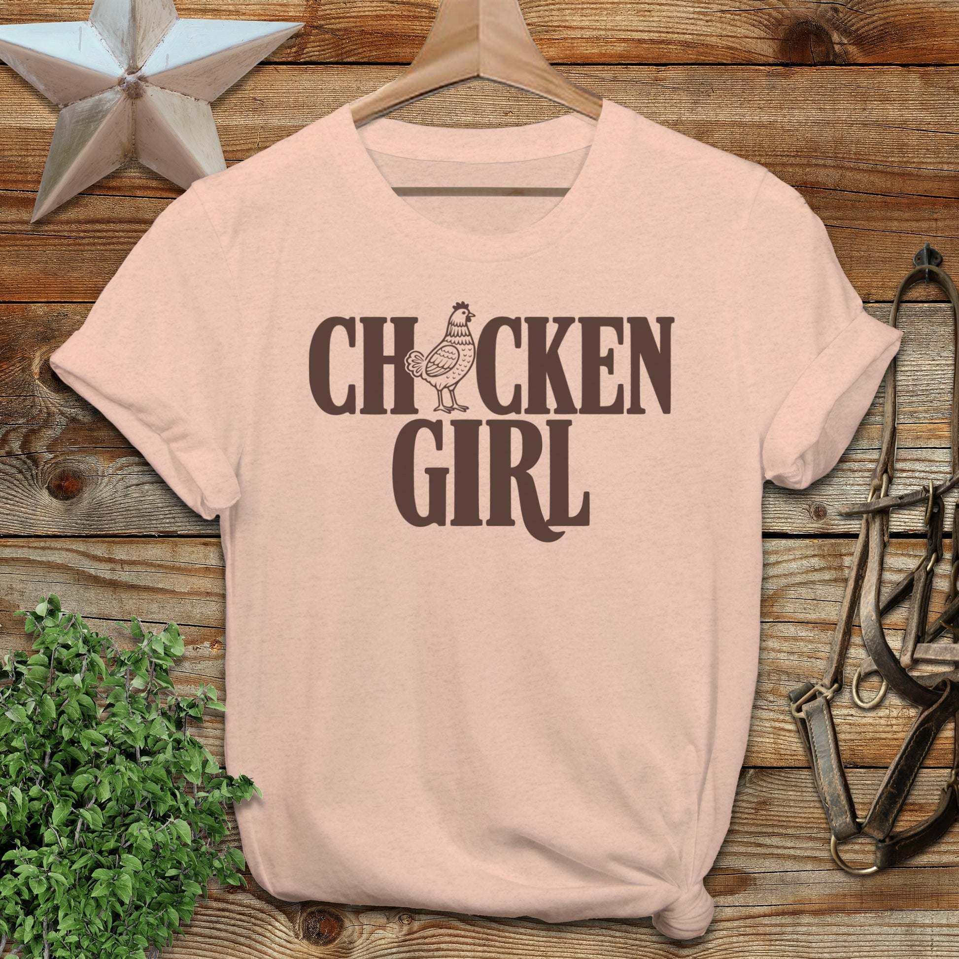 Pale pink t-shirt with "Chicken Girl" text and a chicken graphic.