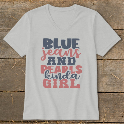 Light gray v-neck t-shirt with "BLUE jeans AND PEARLS kinda GIRL" text.