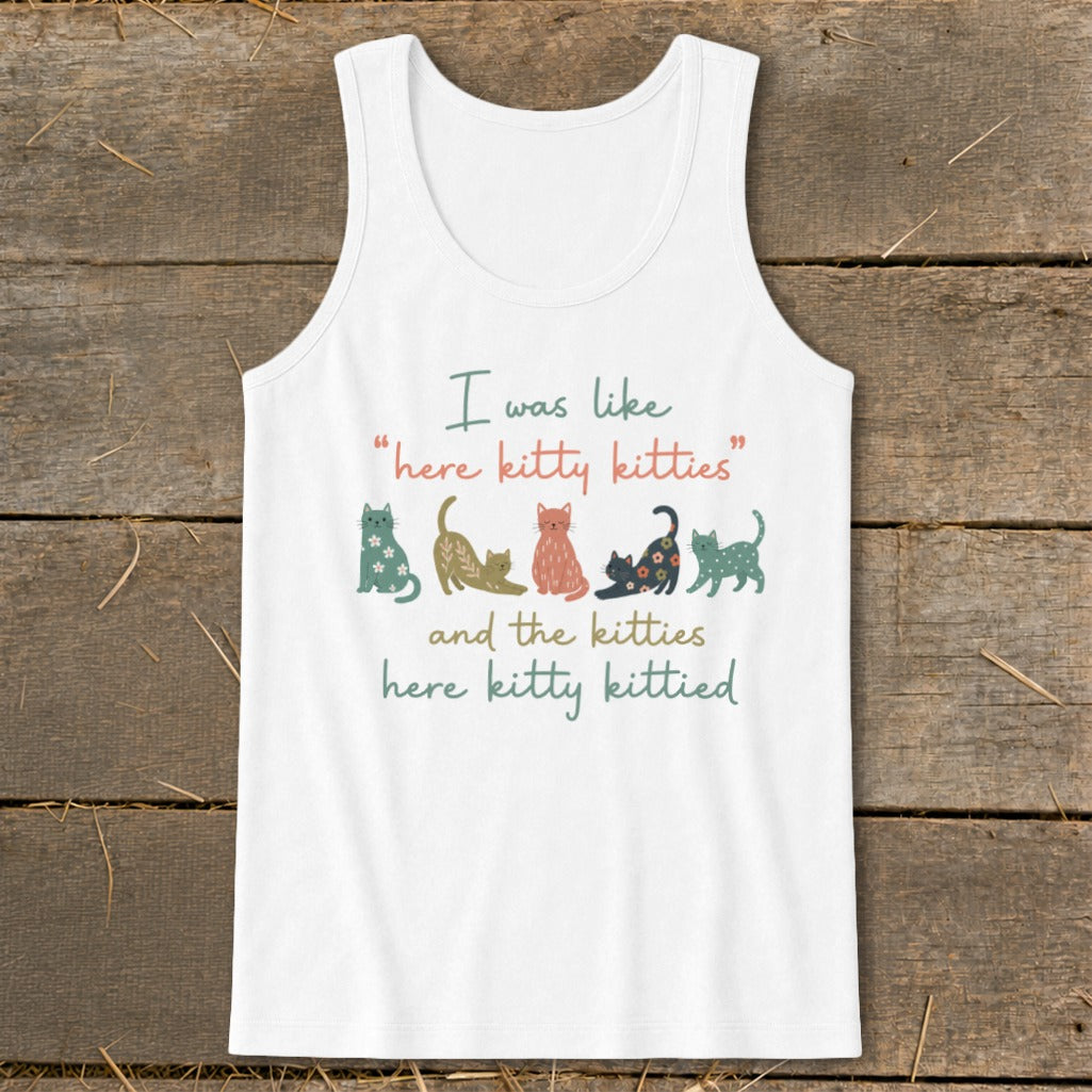 White tank top with text "I was like 'here kitty kitties' and the kitties here kitty kittied" and cats.