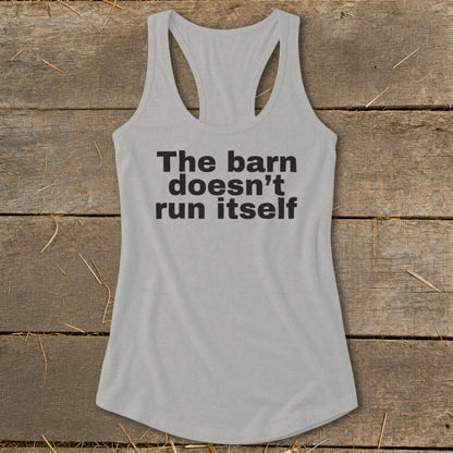 Grey tank top with black text: "The barn doesn't run itself."