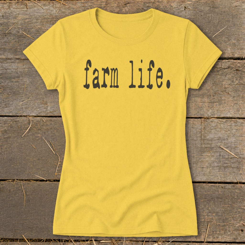Yellow t-shirt with "farm life" text in black block font.