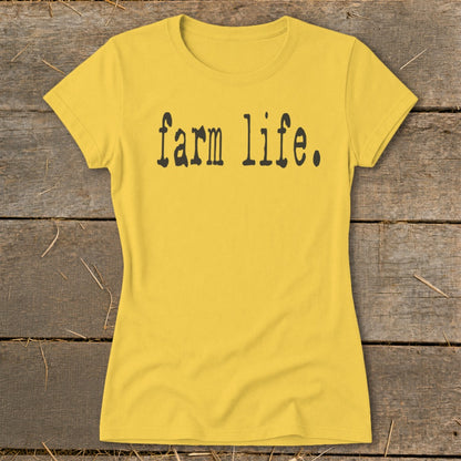 Yellow t-shirt with "farm life" text in black block font.