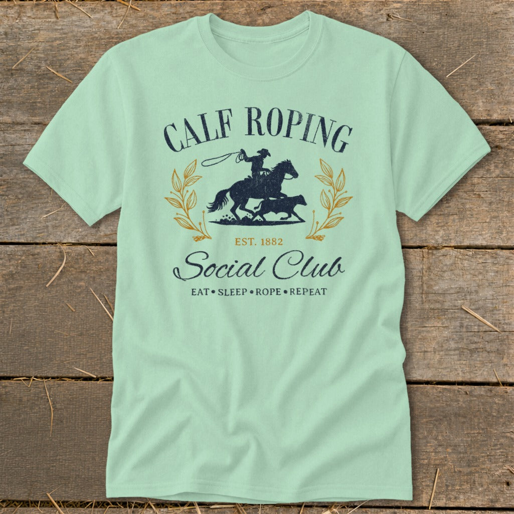 Calf Roping Social Club t-shirt with cowboy on horse and calf graphic.