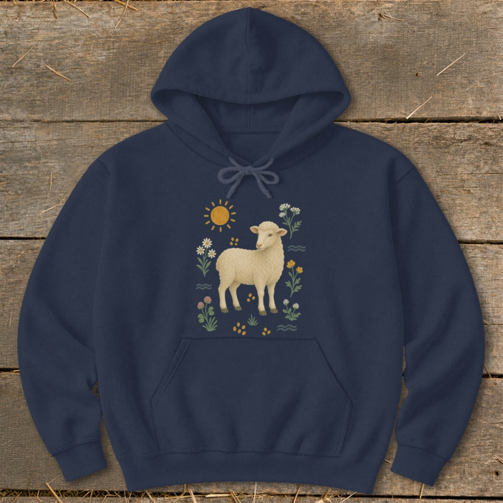 Navy hoodie with a sheep, sun, and floral illustration on the front.