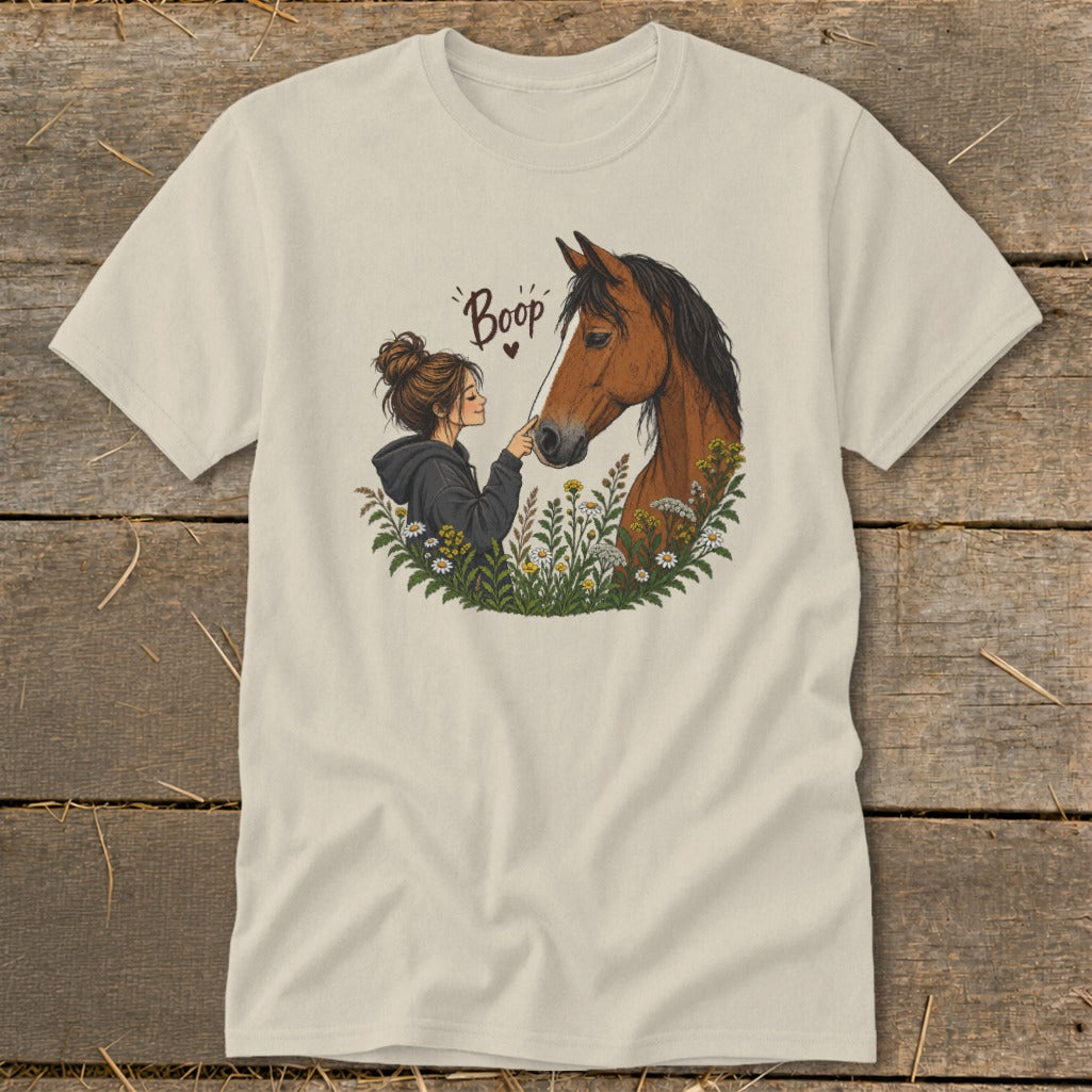 Illustration of a girl booping a horse's nose surrounded by flowers, with "Boop" text.