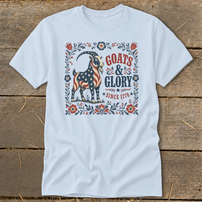 White t-shirt with a goat graphic in American flag colors and text "Goats & Glory Since 1776".