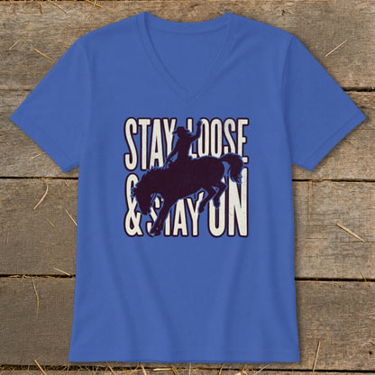 Blue t-shirt with "STAY LOOSE & STAY ON" text and bronco rider silhouette.
