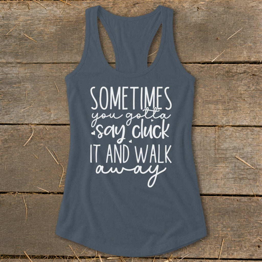 Slate gray tank top with white text that reads "SOMETIMES you gotta say cluck IT AND WALK away".