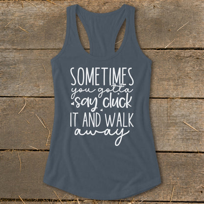 Slate gray tank top with white text that reads "SOMETIMES you gotta say cluck IT AND WALK away".