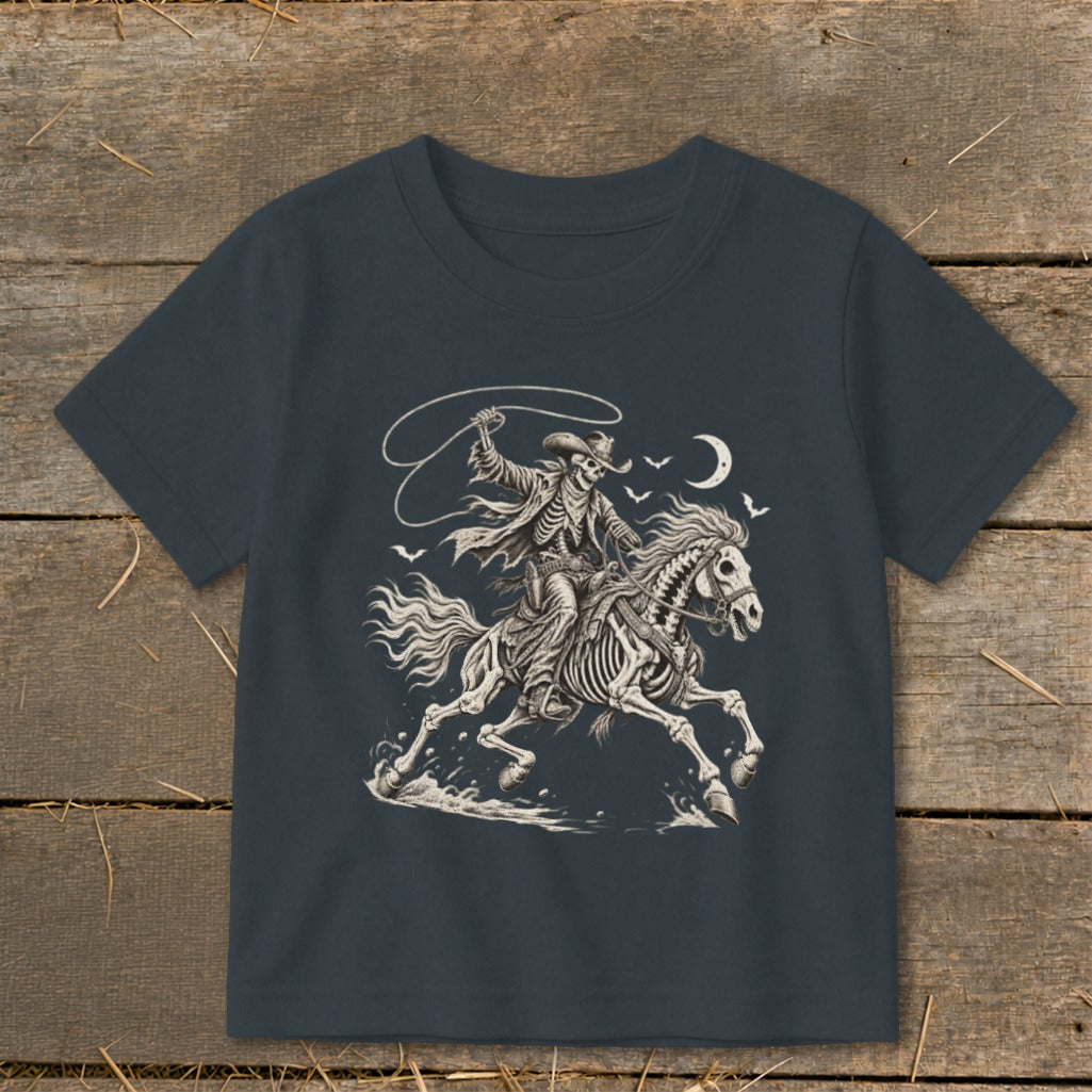 Skeleton cowboy on horseback with lasso under a crescent moon.
