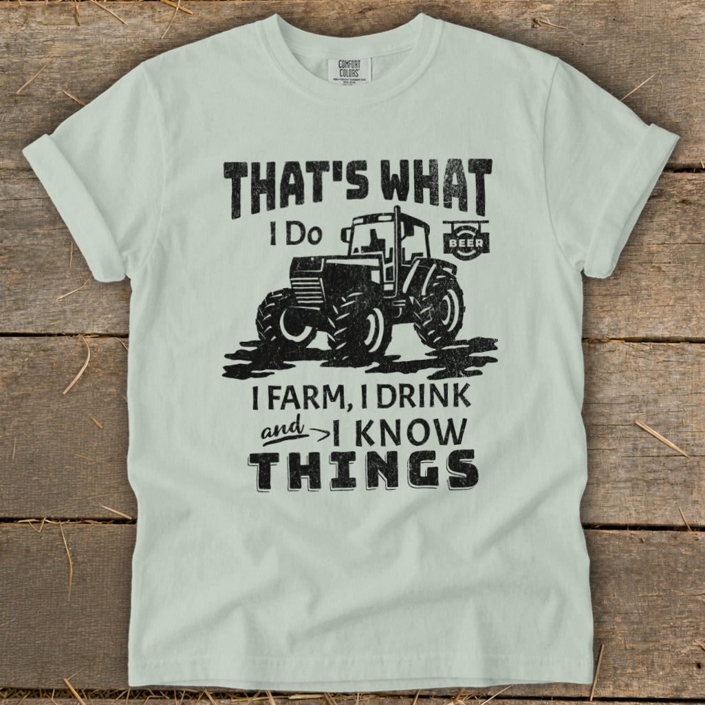 Light green t-shirt with tractor graphic and text "That's what I do. I farm, I drink and I know things."