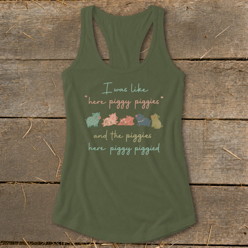 Olive green tank top with text and row of small, colorful pigs.