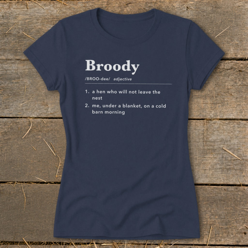 Navy t-shirt with "Broody" definition: hen in nest and me under blanket.