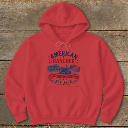 Red hoodie with "American Rancher Est. 1776" graphic featuring a tractor and barn.