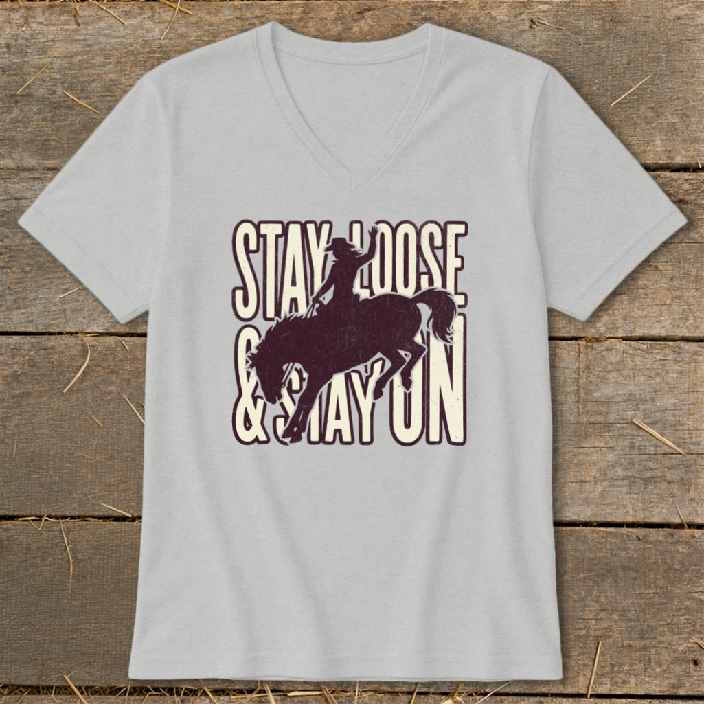 Light grey t-shirt with "STAY LOOSE & STAY ON" and a bucking horse graphic.