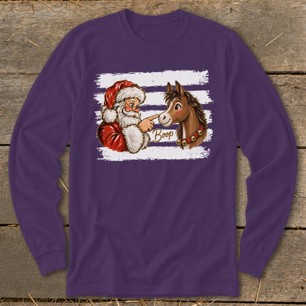 Santa boops a horse on the nose with "Boop" text on a long-sleeved purple shirt.