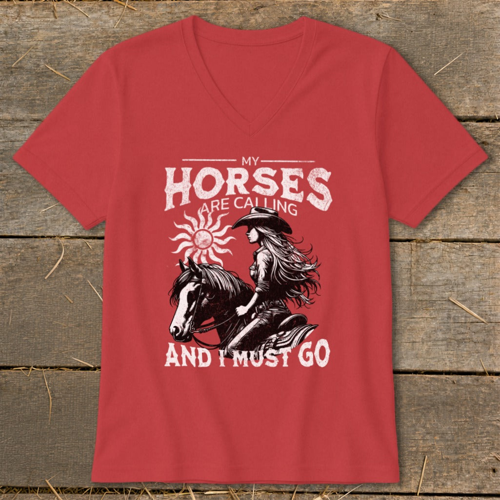 Red t-shirt with distressed graphic of cowgirl on horse, "My Horses Are Calling And I Must Go."