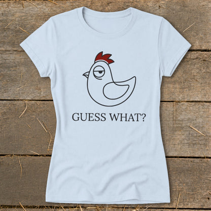 Light blue t-shirt with a cartoon chicken and "GUESS WHAT?" text.
