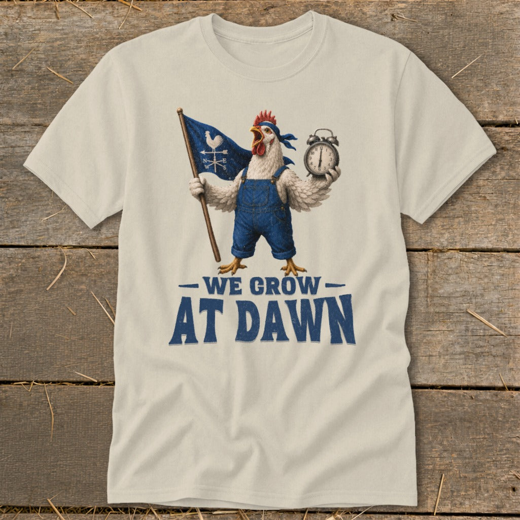 Chicken in overalls holding a flag and alarm clock, text reads "We Grow At Dawn."
