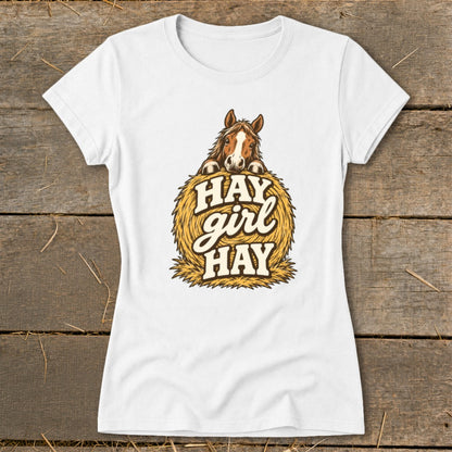 White t-shirt with horse peeking over hay bale and text "HAY girl HAY".