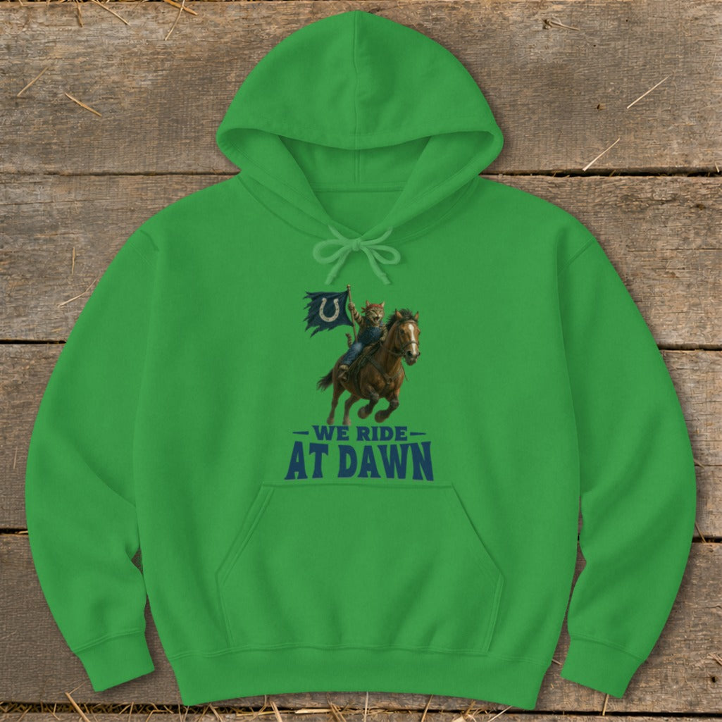 Green hoodie with cat riding horse and flag, reading "We Ride At Dawn."