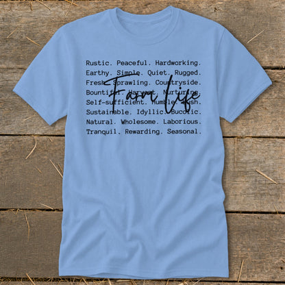 Light blue t-shirt with black text listing farm-life descriptors, including "Farm life" overlay.