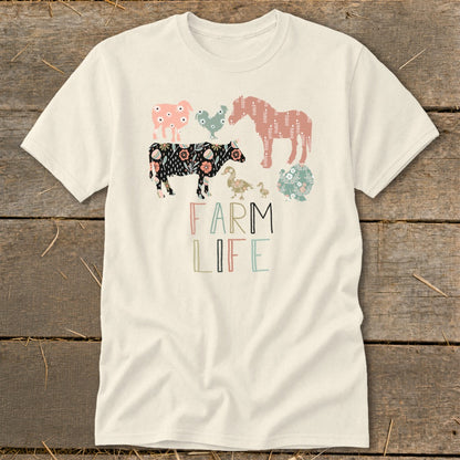 Cream t-shirt with "FARM LIFE" text and various farm animals in floral patterns.