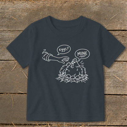T-shirt with a cartoon of a hen protecting her eggs with text "eggs?" and "MINE".