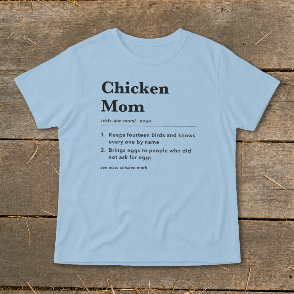 Light blue t-shirt with "Chicken Mom" definition and related phrases in black text.