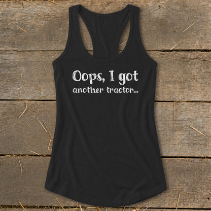 Black tank top with white text that reads "Oops, I got another tractor..."