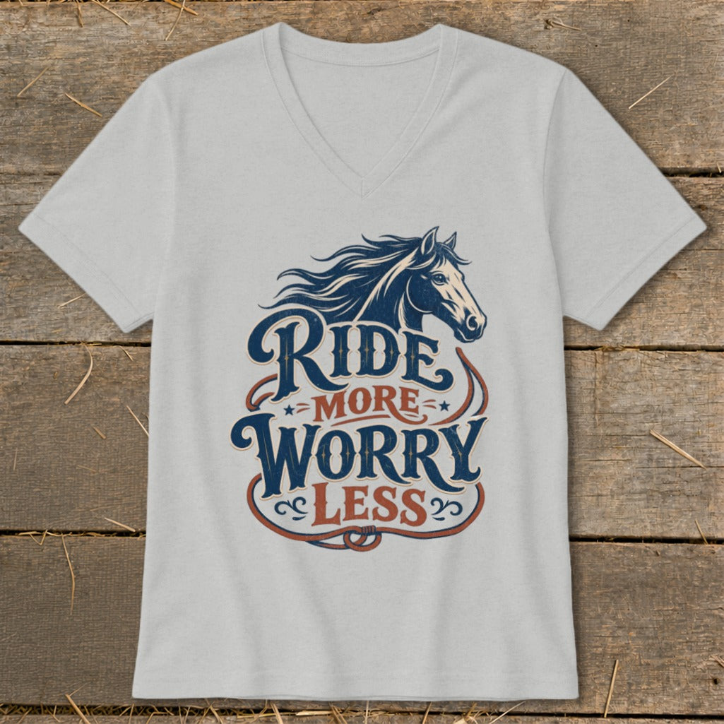 Light gray t-shirt with a blue horse graphic and text "Ride More Worry Less".