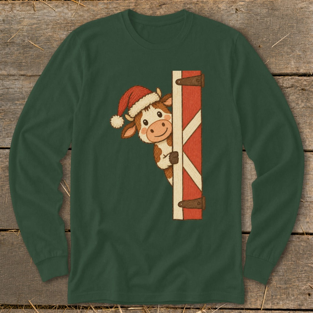 Cow wearing a Santa hat peeking from behind a barn door.