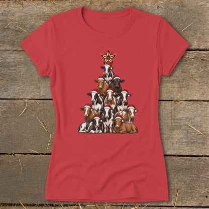 Christmas tree made of cows wearing Santa hats, topped with a star.