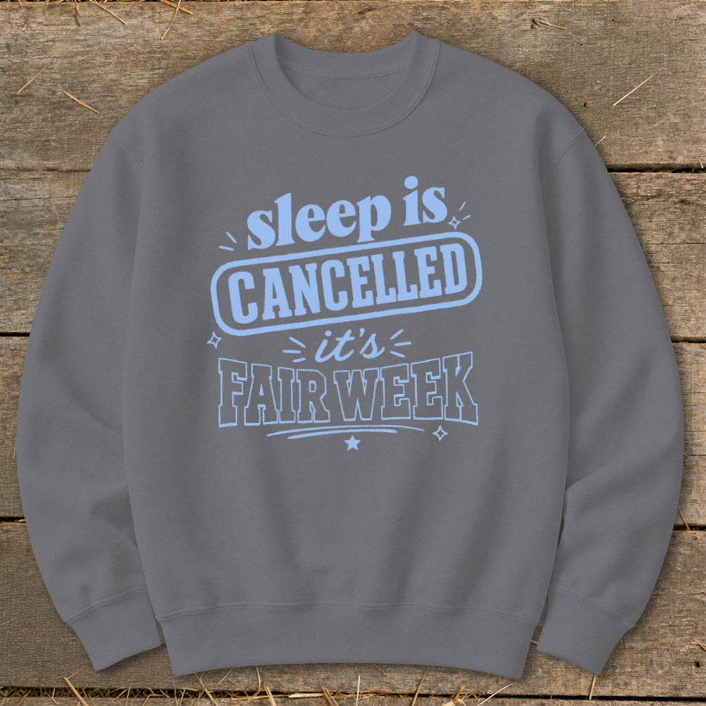 Grey sweatshirt with light blue text that says "sleep is CANCELLED it's FAIR WEEK".