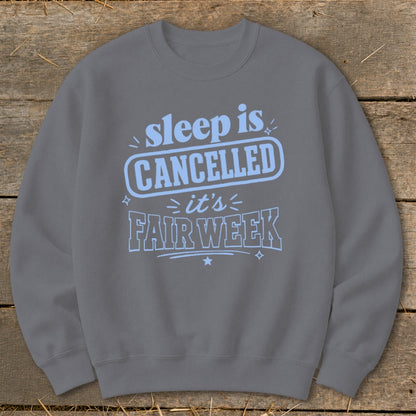 Grey sweatshirt with light blue text that says "sleep is CANCELLED it's FAIR WEEK".