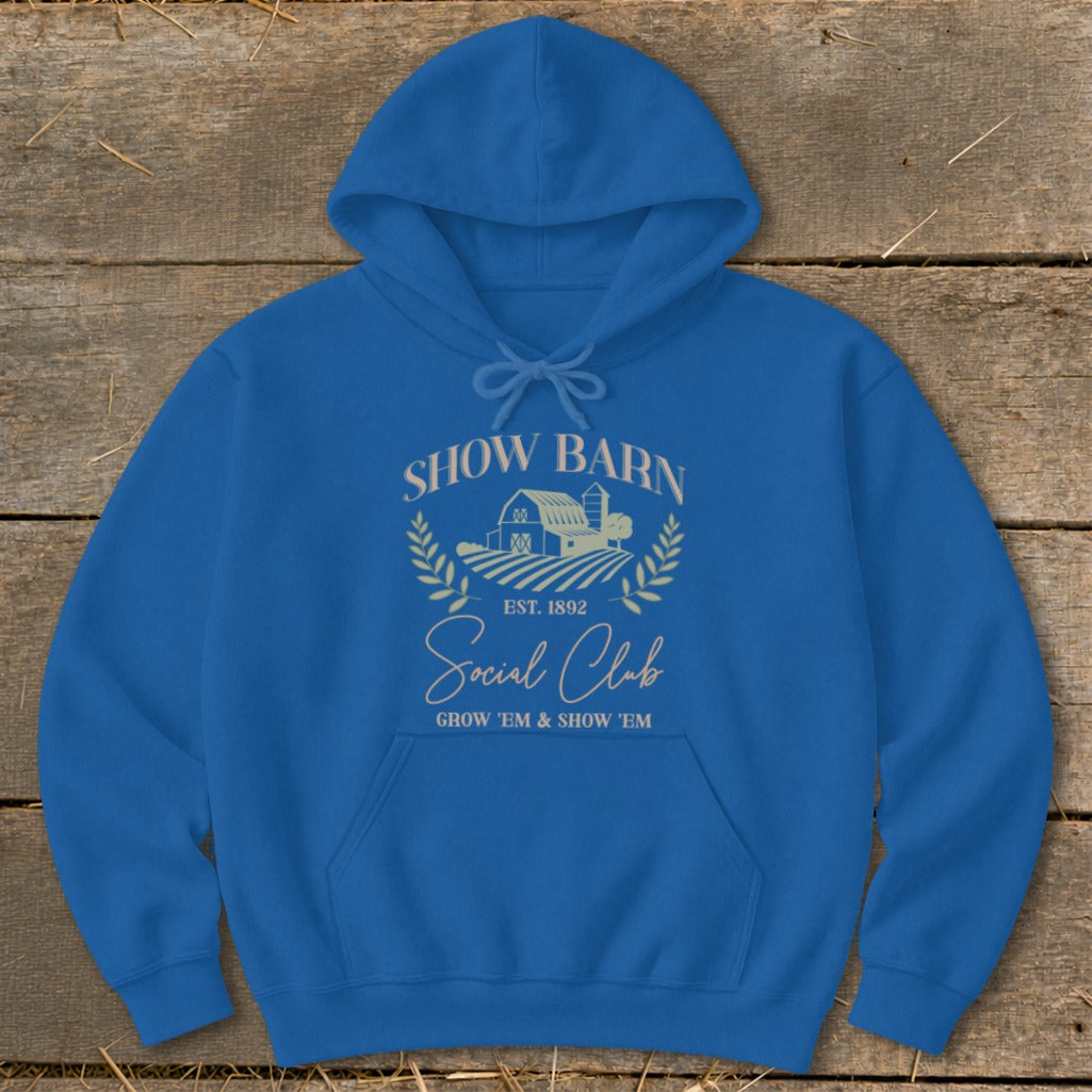 Blue hoodie with "Show Barn Social Club" text and a barn graphic.