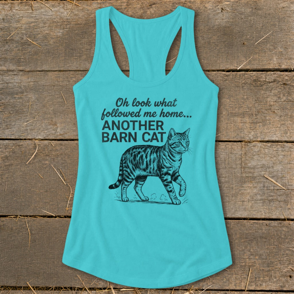 Turquoise tank top with text "Oh look what followed me home... ANOTHER BARN CAT" and a tabby cat illustration.