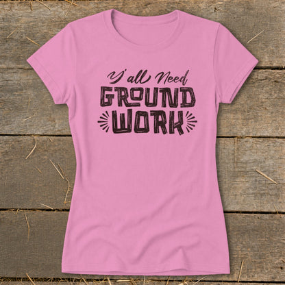 Pink t-shirt with "Y'all Need GROUND WORK" text design.