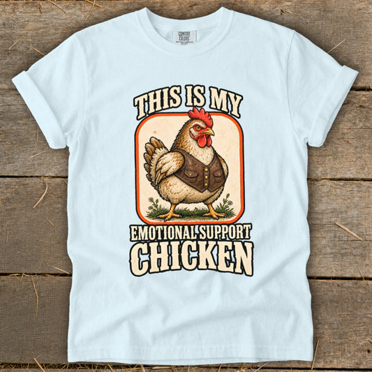 Light blue t-shirt with a chicken graphic that reads "This is my emotional support chicken."