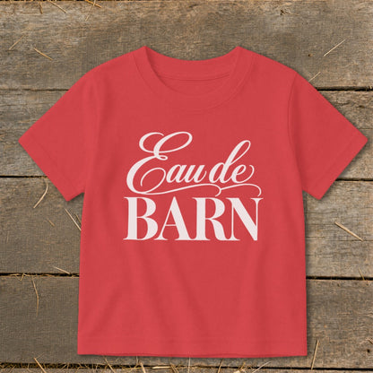 Red t-shirt with white "Eau de BARN" text in script and block font.