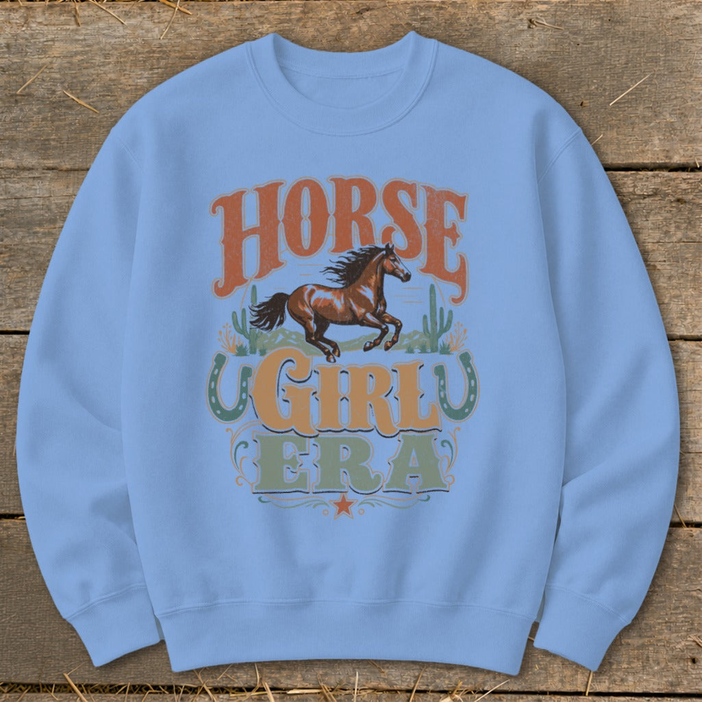 Light blue sweatshirt with "Horse Girly Era" text and a running horse graphic.
