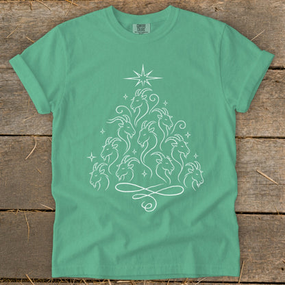 Green t-shirt with white line art Christmas tree made of goats.